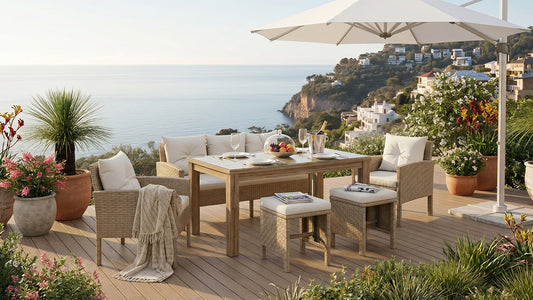 Beige wicker outdoor dining set with umbrella and ocean view