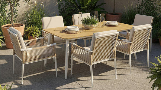 White outdoor dining set with rope chairs and timber table on patio