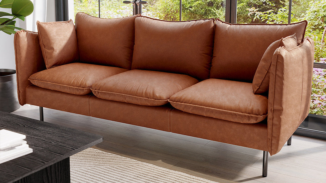 brown 3 seater sofa bed in the living room