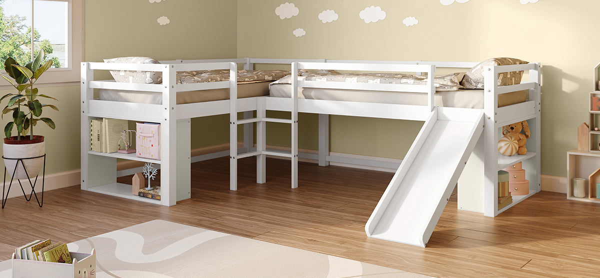 Children's bedroom corner featuring a white, L-shaped loft bed with a slide, ladder, integrated shelving with books and toys, and a soft play rug below.