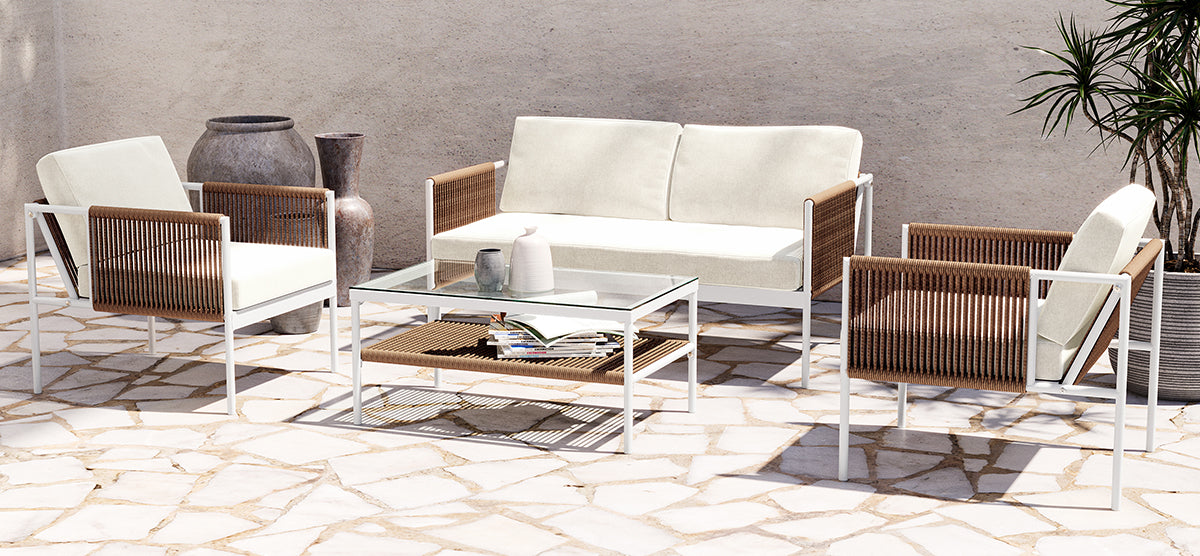 Modern outdoor seating area with two armchairs, a two-seat sofa with white metal frames, woven sides, off-white cushions, a glass-topped coffee table, and decorative vases.