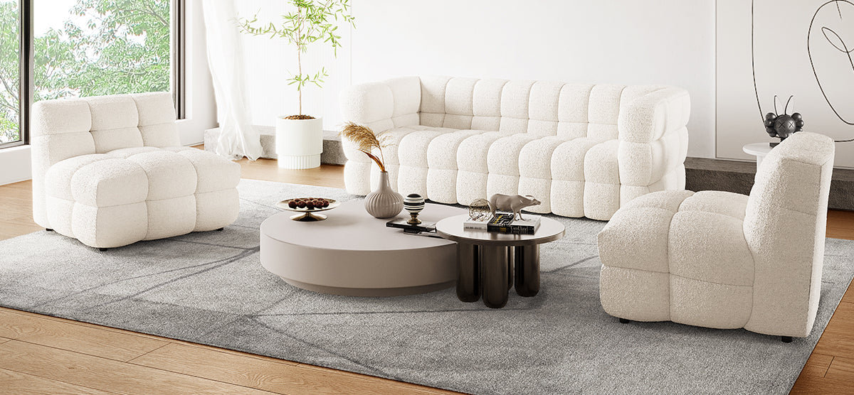 Norah 5 Seater Boucle Sofa Set With Ottoman Cream White, featuring a plush, modular design with a single-seater, three-seater, and ottoman, enhancing comfort and style in a sophisticated living room setting.
