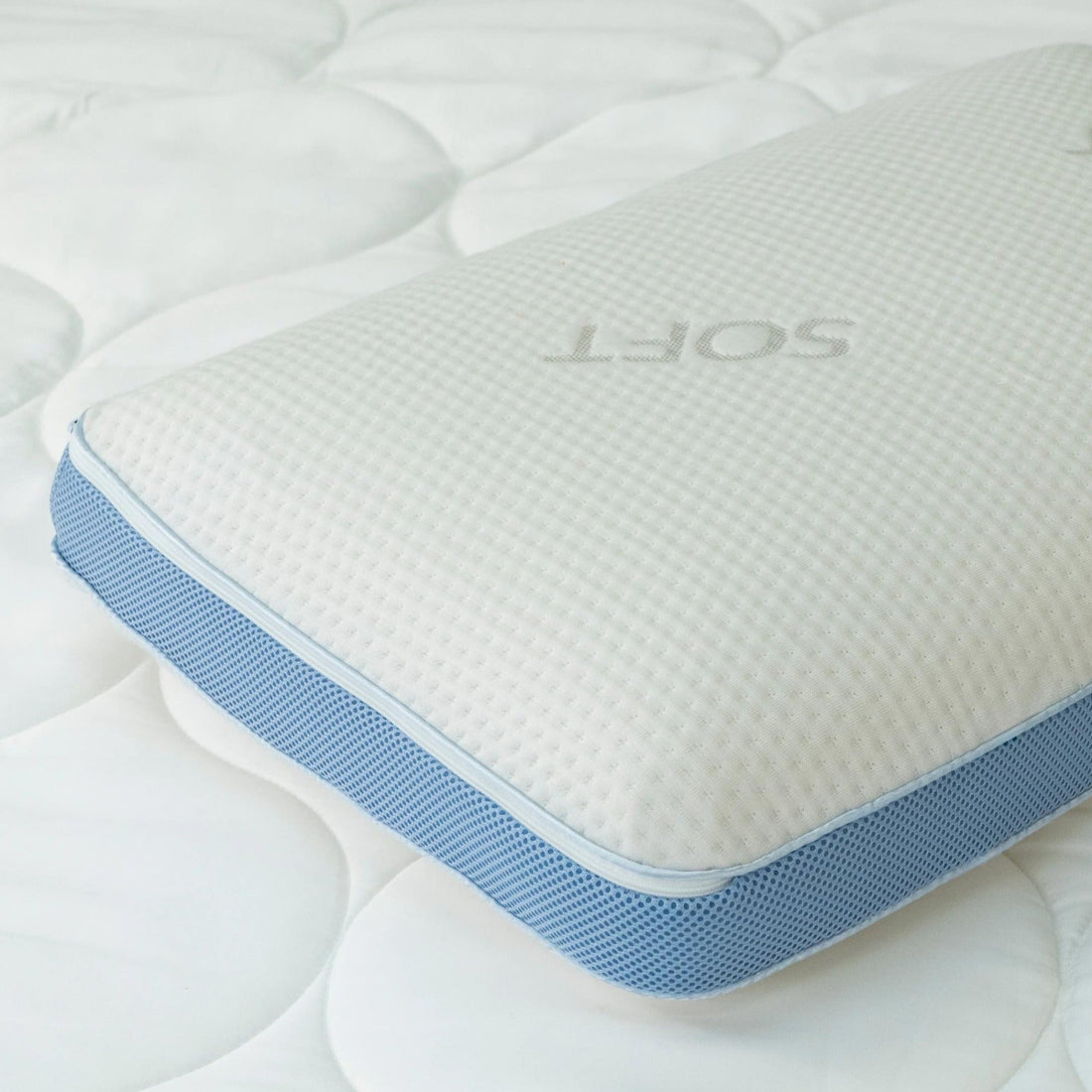 Close-up of the Soft variant's corner, showing the blue mesh gusset panel and "Soft" label
