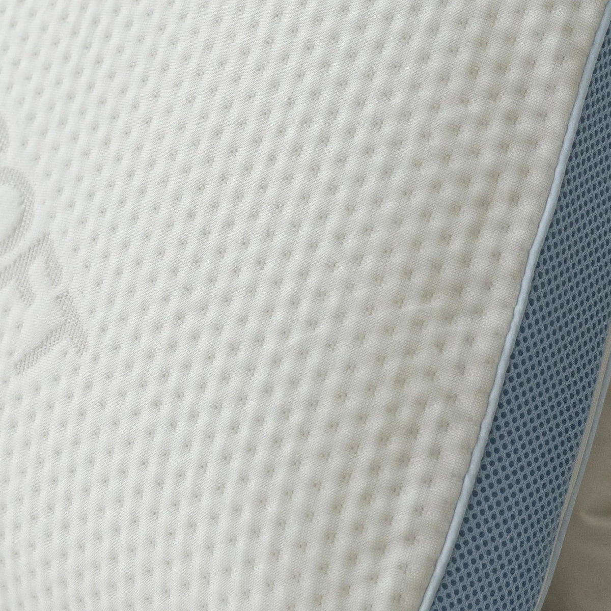 Close-up of the Tencel jacquard fabric weave with the gusset edge visible