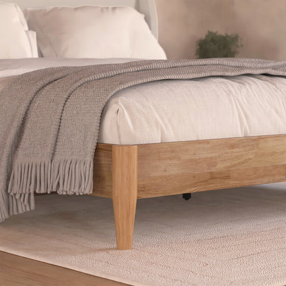 Aetiusa Winged Fabric Hardwood Bed Frame - Beige King, featuring a winged, padded headboard with soft corduroy fabric, and a sturdy hardwood frame in a modern bedroom setting.