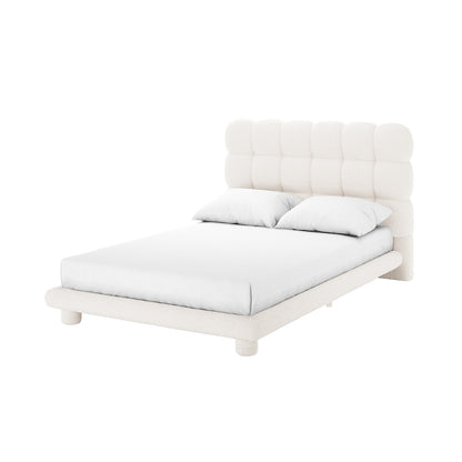 Aina Double Boucle Bed Frame in Cream White features a low-profile, upholstered design with a chunky, grid-style padded headboard, matching frame, and short cylindrical legs, showcasing elegance and comfort.
