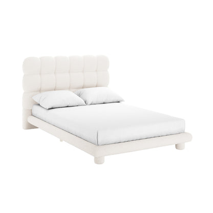 Aina Double Boucle Bed Frame in Cream White showcases a chunky, grid-tufted headboard with square pillows, upholstered in soft bouclé fabric. It features a simple frame on short rounded legs.