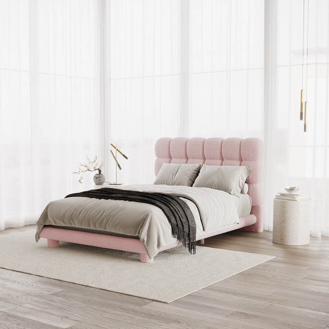 Aina Double Bouclé Bed Frame in Pink, featuring a plush tufted headboard in soft boucle fabric, styled with light gray bedding, situated in a bright, minimalist bedroom with elegant decor elements.