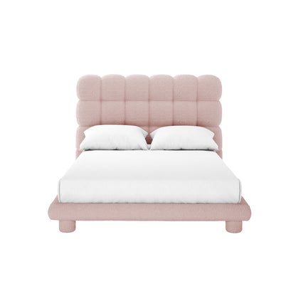 Aina Double Bouclé Bed Frame in Pink with plush, tufted headboard, low frame on short legs, and crisp white bedding, showcasing a luxurious, modern design perfect for a stylish bedroom.