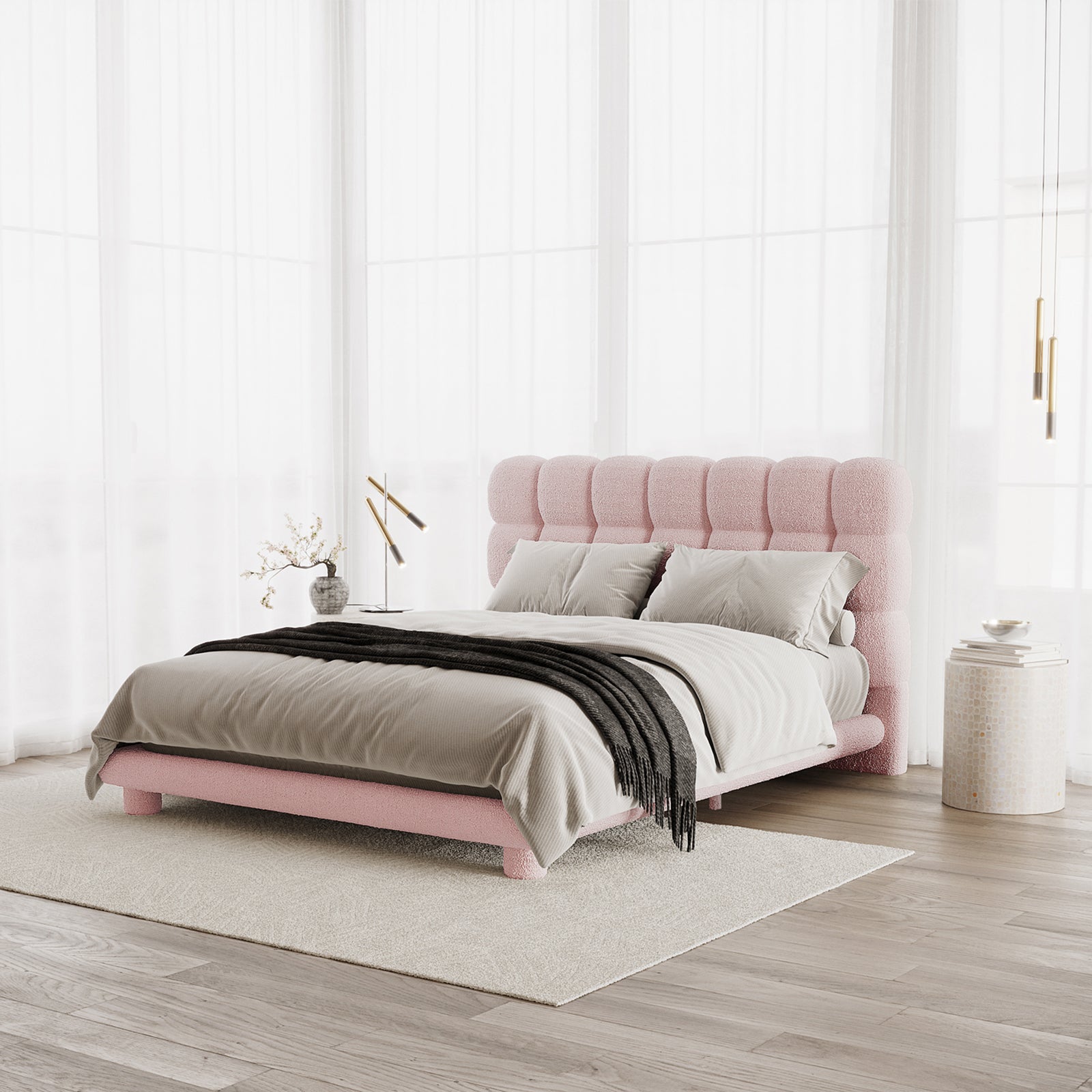 Aina Queen Bouclé Bed Frame in Pink features a tufted headboard, upholstered in soft bouclé fabric, set in a modern bedroom with neutral linens and minimalist decor.