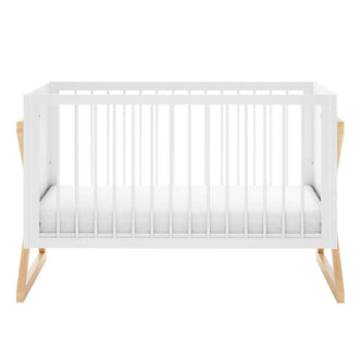 Aldwin & Melai Solid Pine Baby Cot with Convertible Rail Set White, featuring a sleek white slatted frame, thin mattress, and light-natural wood legs, designed for versatile use from bassinet to toddler bed.