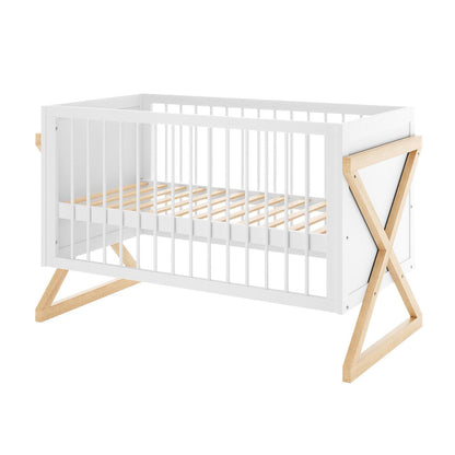 Aldwin & Melai Solid Pine Baby Cot with Convertible Rail Set White features a white frame with natural wood X-shaped legs, slatted sides, and a wooden slat mattress platform, showcasing modern elegance and versatility.