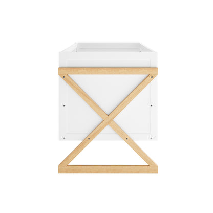 Aldwin Pine Adjustable Baby Cot - White/Natural, featuring a white wooden box design on a natural-wood X-leg frame, reflecting a modern, versatile nursery essential with adjustable and convertible features.