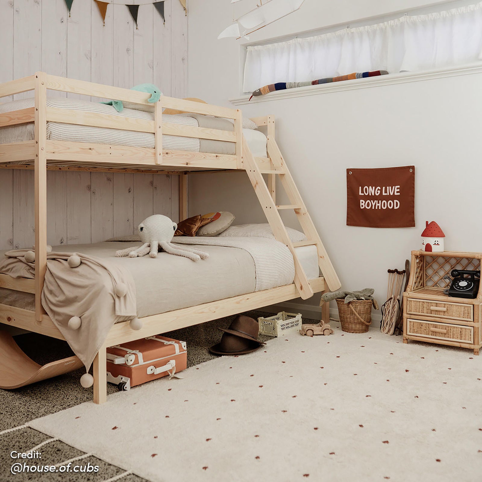 Antonia Wooden Triple Bunk Bed - Natural, featuring a sturdy triple-tier design with a double-size bottom and single-size top bunk, visible guard rails, and a reversible ladder, perfect for space-saving.