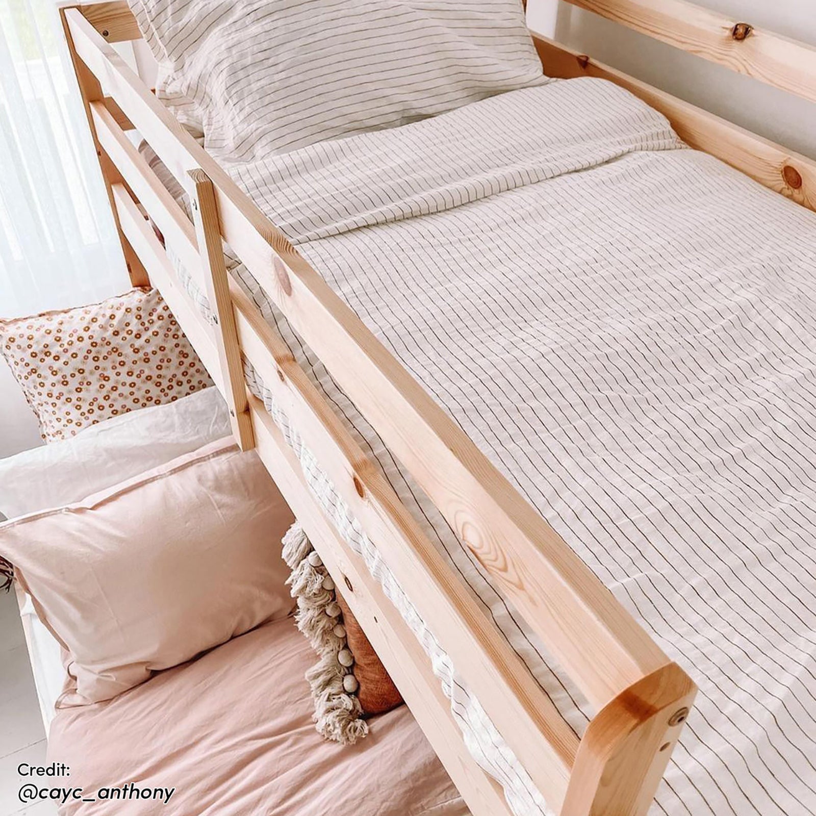 Antonia Wooden Triple Bunk Bed - Natural features a sturdy solid pine wood frame with a triple bunk configuration, showcasing a double-size bottom and single-size top bunk with secure guard rails.