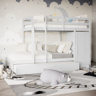 Aron Single Storage Bunk Bed with Trundle in White in a child’s room, featuring a loft-style design, pull-out drawer, neutral linens, star-patterned pillows, and adjacent cabinet for organized storage.