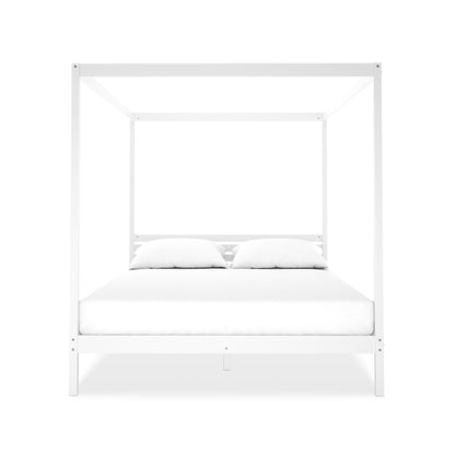 Aurelius Queen Solid Pine 4-Post Canopy Bed Frame in White, featuring a minimalist design with a mattress and two pillows, highlighting its elegant four-poster structure for a luxurious bedroom setting.