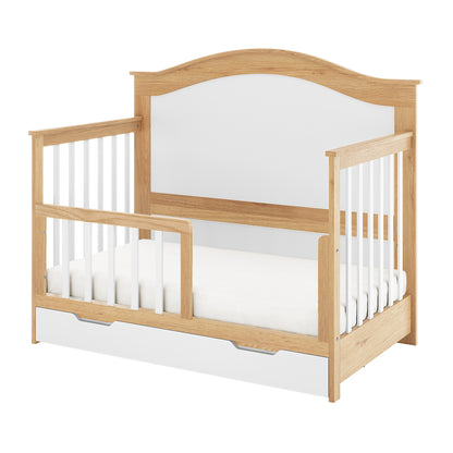 Azeem & Giro Solid Pine Convertible Cot Set with light oak frame, white slatted side rails, white panel headboard, removable guardrail, and built-in storage drawer.