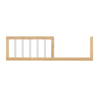 Azeem & Giro Solid Pine Baby Cot with Convertible Rail Set features a wooden frame with vertical slats, designed as a safety rail to prevent toddlers from rolling out of bed.