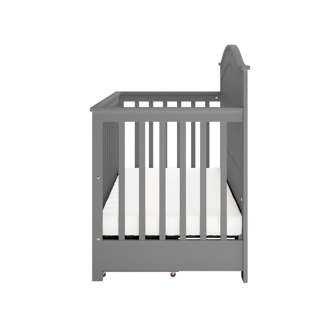 Azeem 3-in-1 Adjustable Solid Pine Baby Cot Grey, shown side-on with slatted rails, gray finish, solid headboard, and white mattress, highlighting its convertible, adjustable features for nursery adaptability.