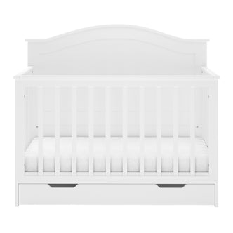 Azeem 3-in-1 Adjustable Solid Pine Baby Cot – White features a convertible design with vertical slats, a curved headboard, and a built-in under-cot drawer for convenient storage.