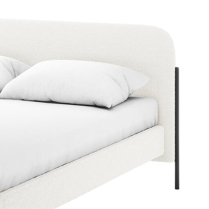 Bonny Double Boucle Fabric Bed Frame in Cream White, showcasing a curved upholstered headboard and frame in off-white boucle fabric, resting on slender black metal legs with crisp white bedding.