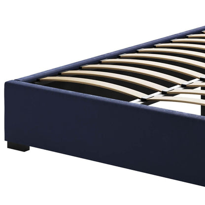 Septima Upholstered Velvet Queen Bed Base - Navy, featuring a plush velvet texture, close-up of wooden slats, and sturdy bed frame, showcasing its luxurious design and durable construction.