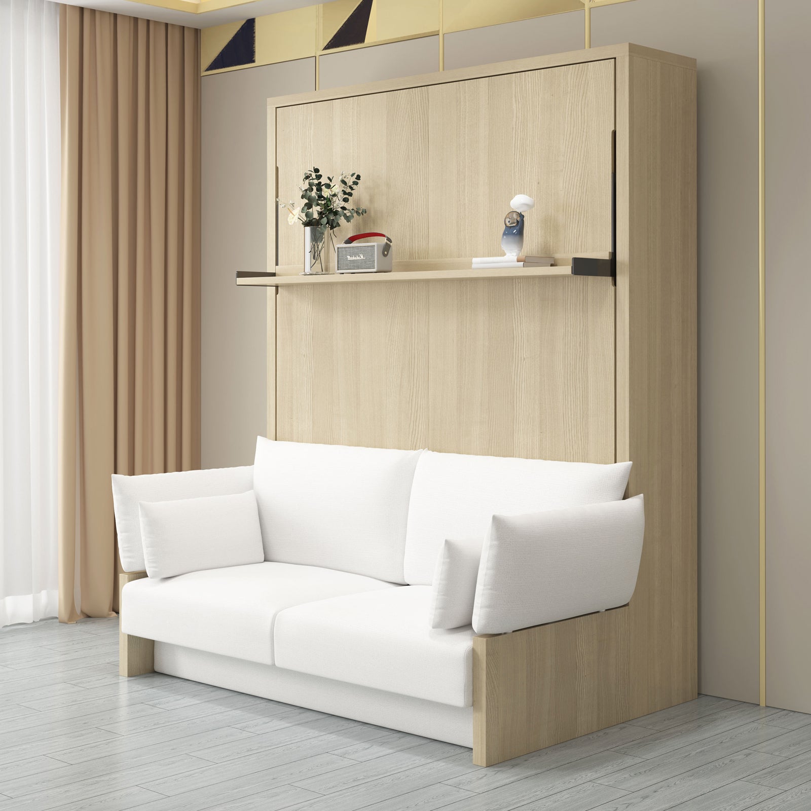 Byron Queen 2-in-1 Foldout Wall Bed & Sofa in White, featuring a closed wall-mounted bed above a compact upholstered sofa with cushions. A narrow shelf holds decor items and a plant.