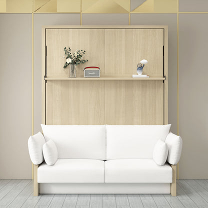 Byron Queen 2-in-1 Foldout Wall Bed & Sofa in White, featuring a compact white sofa with padded arms, and a fold-down oak wall unit, accessorized with a vase, radio, and figurine.