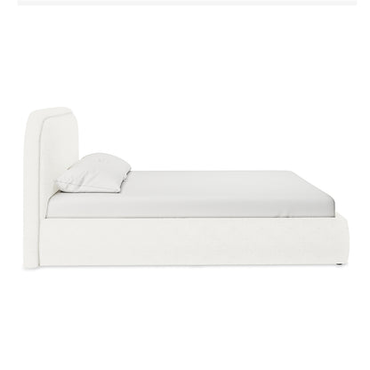 Calix Double Boucle Bed Frame in Cream White: A low-profile, platform bed with a tall, curved headboard and matching pillow, upholstered in textured fabric, offering a minimalist and elegant look.
