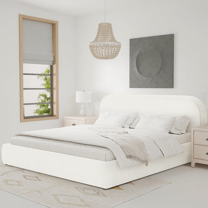 Calix Super King Boucle Bed Frame in Cream White, featuring a low-profile design with elegant boucle fabric, centered in a minimalist bedroom with pale gray sheets and a light-beige throw.