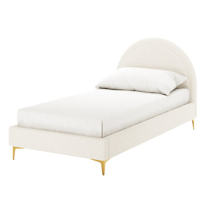 Camryn Kids Single Bouclé Bed Frame in Cream White, featuring a rounded arch headboard, slim gold-metal legs, and matching mattress and pillow, showcasing minimalist luxury and comfort for a child's bedroom.