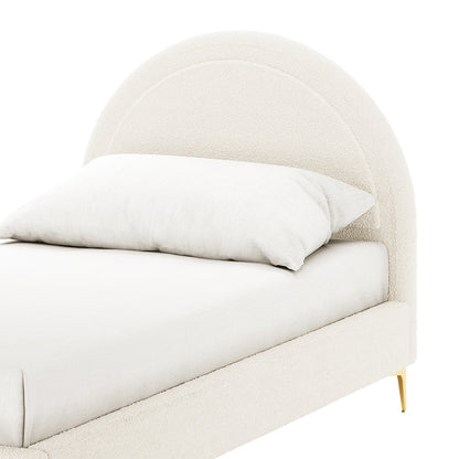 Camryn Kids Single Bouclé Bed Frame in Cream White features a low-profile, off-white bouclé upholstered frame, arched headboard, and slim tapered brass-tone legs, creating a contemporary and elegant sleep space.