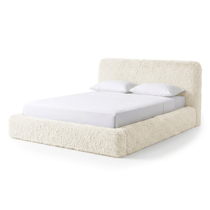 Modern plush upholstered bed shown fully on a white background