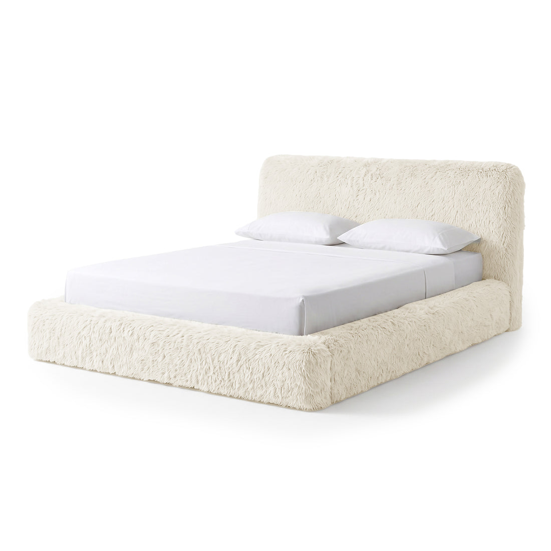Cream shaggy upholstered bed on a white background.