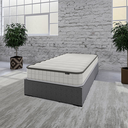 Coreen Loft Bed & Cybele Mattress Package Grey shown in a room with a plant by a window, featuring a loft design, built-in slide, and safety rails, ideal for kids’ bedrooms.