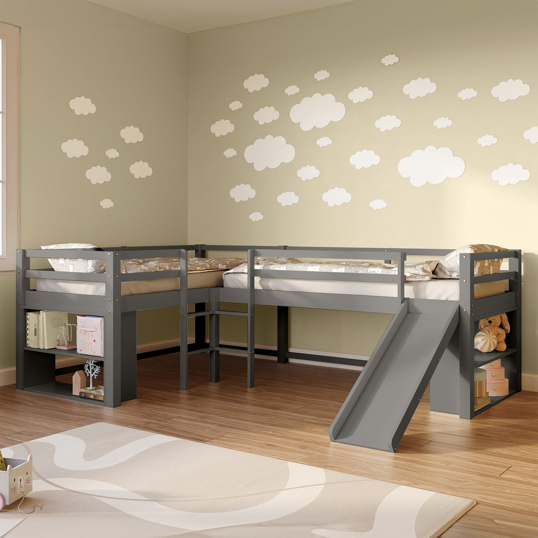 Coreen Solid Pine Storage Loft Bed with Slide - Grey features a fun slide, built-in ladders, and open shelves, maximizing space with its L-shaped design, all visible in a child-friendly bedroom setting.