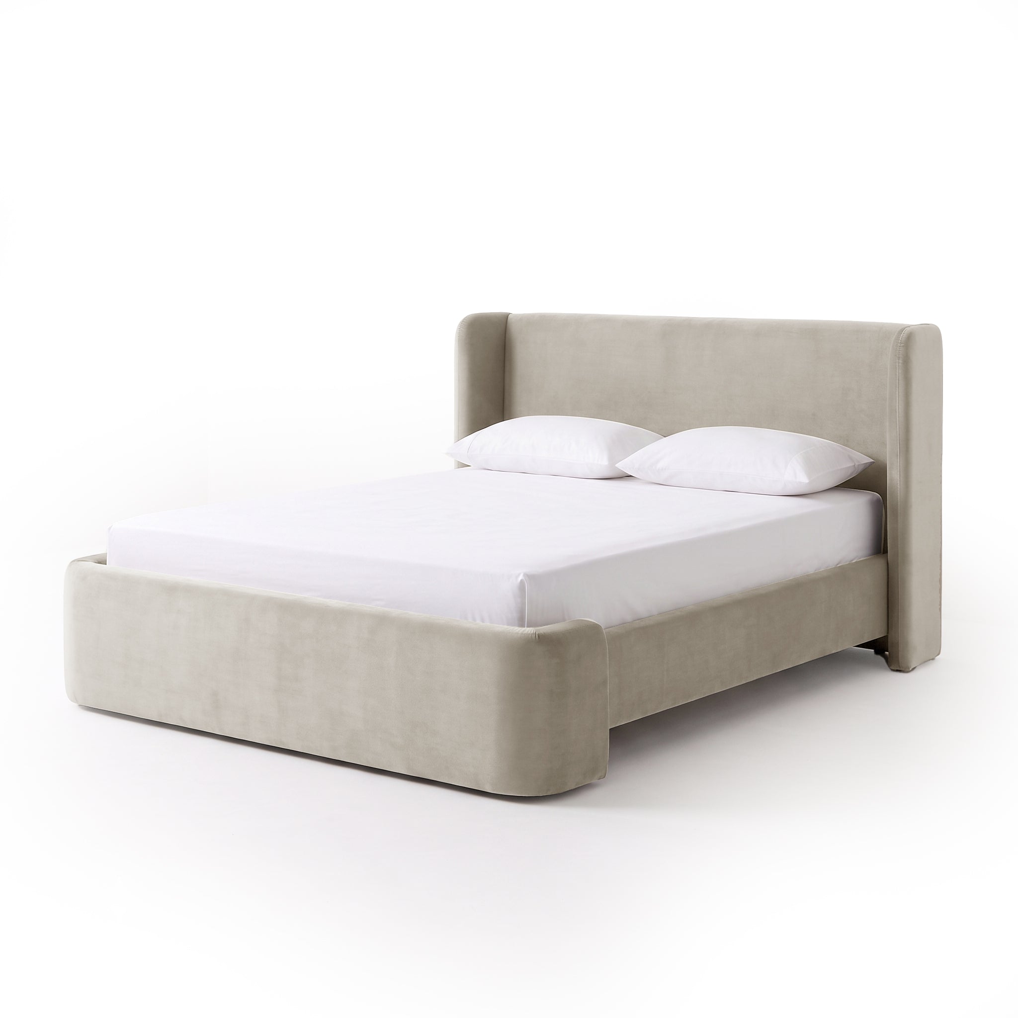 Upholstered king bed with headboard and footboard on a white background