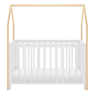 Damaris & Giro Solid Pine Baby Cot with Convertible Rail Set White features a white slatted base with natural wood posts, forming a house-shaped frame, highlighting its whimsical and adaptable nursery design.
