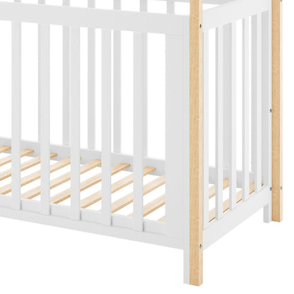 Damaris & Giro Solid Pine Baby Cot with Convertible Rail Set White features vertical white slatted side rails and natural wood-tone corner posts, showcasing a sturdy and stylish nursery solution.