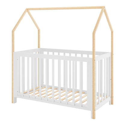 Damaris Solid Pine Baby Cot Bed - White/Natural features a unique house-frame design with white slatted sides and natural wood posts, creating a peaked-roof shape above the sleeping area.
