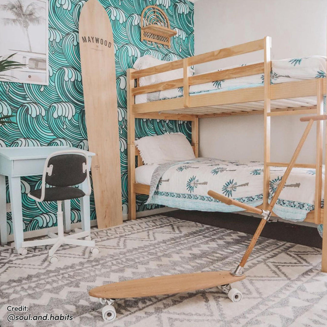 Dante 2-in-1 Solid Pine Timber Bunk Bed - Natural, featuring a wooden frame with smooth edges, robust slats, and a secure ladder, positioned in a room next to a small desk and chair.