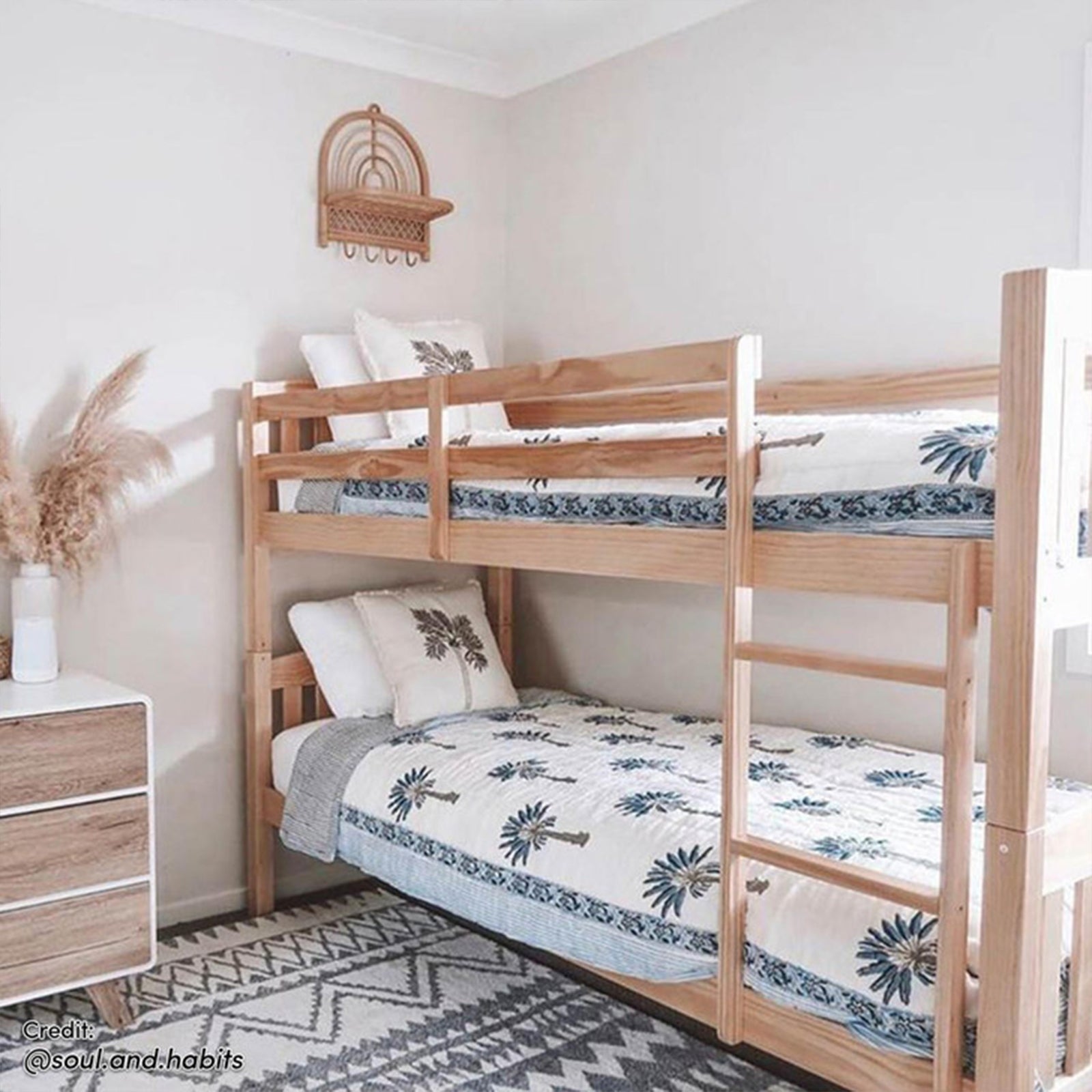 Dante 2-in-1 Solid Pine Timber Bunk Bed - Natural, featuring a convertible design with solid wood construction, secure ladder, and smooth edges, displayed in a room setting, highlighting its space-saving functionality.