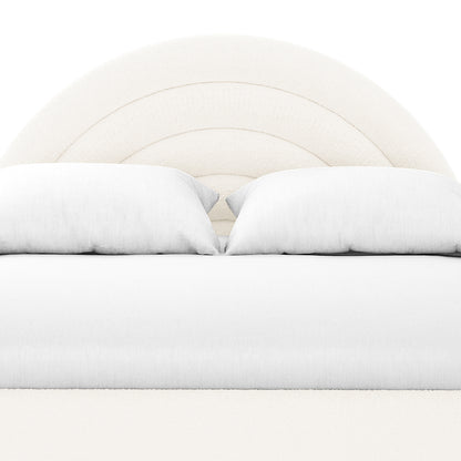 Estilla Double Rainbow Boucle Bed Frame in Cream White features a curved arch-shaped headboard upholstered in soft bouclé fabric, complemented by white linens and pillows, creating a cosy, stylish bedroom setting.