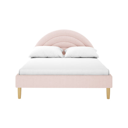 Estilla Double Rainbow Boucle Bed Frame in Ice Blue features a scalloped, rainbow-arc headboard, blush-pink upholstered frame, white bedding, and turned wooden legs, ideal for a charming, cozy children’s bedroom.