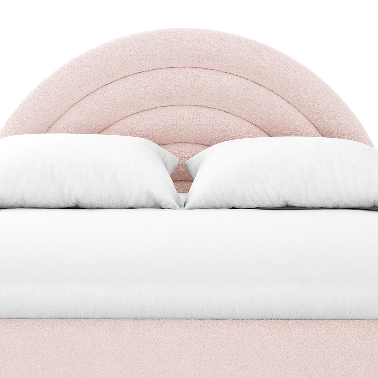 The Estilla Double Rainbow Boucle Bed Frame showcases a rounded, arch-style blush-pink headboard with concentric stitching, complemented by white pillows and bedding, offering a charming and cozy children’s bedroom upgrade.