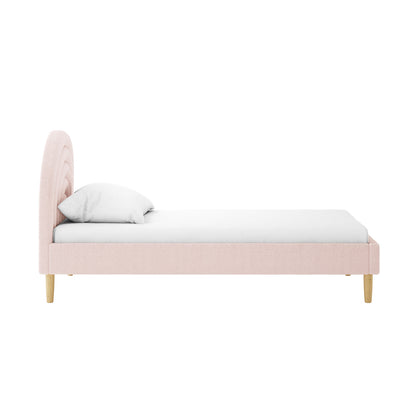 Estilla Single Rainbow Boucle Bed Frame in Ice Blue features a gently curved, channel-tufted headboard, pale pink boucle-style upholstery, and natural wood legs, enhancing bedroom charm and comfort.