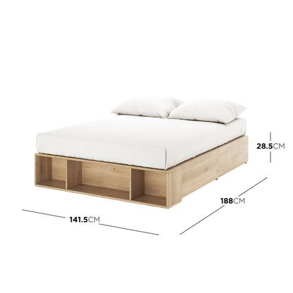 Eulalia Double Storage Platform Bed Base with Drawer in Oak, featuring a low-profile wooden frame with open cubby storage at the foot, shown with mattress and pillows, measures 141.5 cm wide.