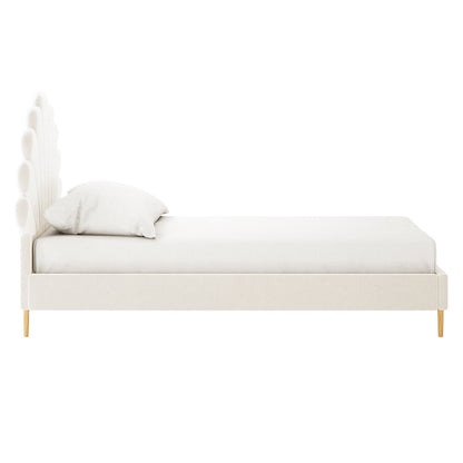 Fayette Kids Single Velvet Fabric Bed Frame in Cream White features a scalloped headboard and light wood legs, creating a whimsical and cozy sleeping area for children.