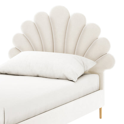 Fayette Kids Single Velvet Fabric Bed Frame in Cream White with a scalloped, fan-shaped headboard, upholstered in light cream velvet, resting on wooden legs. Dressed in white bedding with a single pillow.